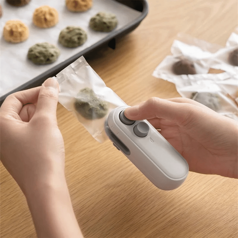 ✨Last Day 49% OFF💥Small 2-in-1 Rechargeable Magnetic Snack Sealer Household Mini Sealing Machine